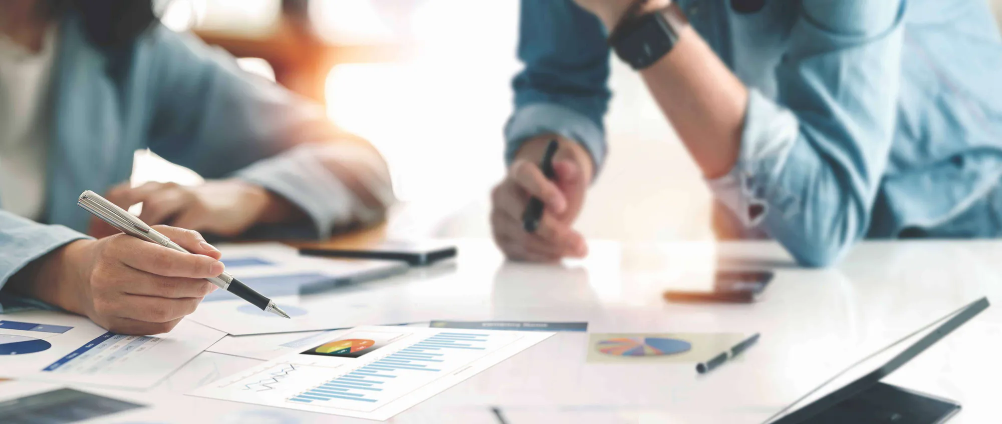 Experts analyzing data-driven strategies for successful EB1A petitions